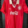 Camisa Internacional Umbro 1990 listrada vermelha