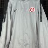 Jaqueta Internacional Nike 2018 Storm-Fit cinza